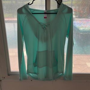 Woman’s long sleeve baby green shirt